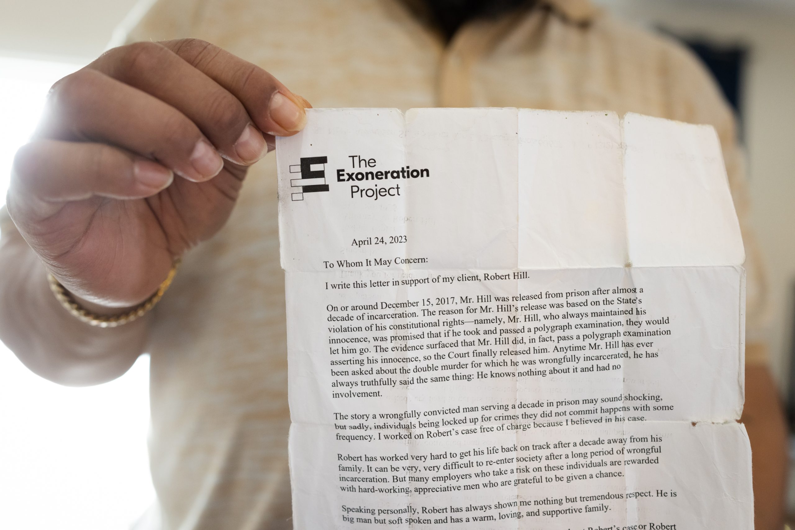 A photograph of a letter Robert Hill, 56, carries with him in a pouch, explaining that he was exonerated.