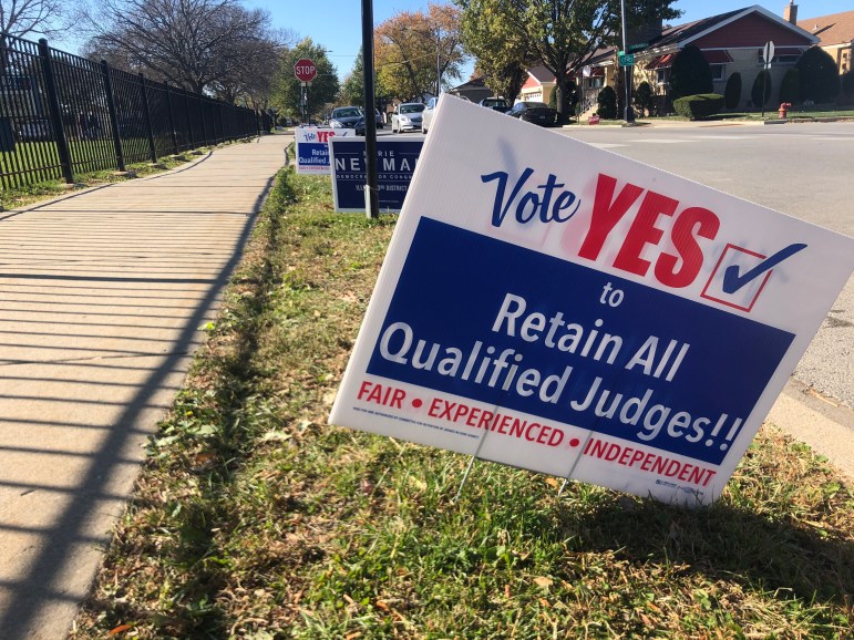 Election sign urging "Yes" vote on all retention judges